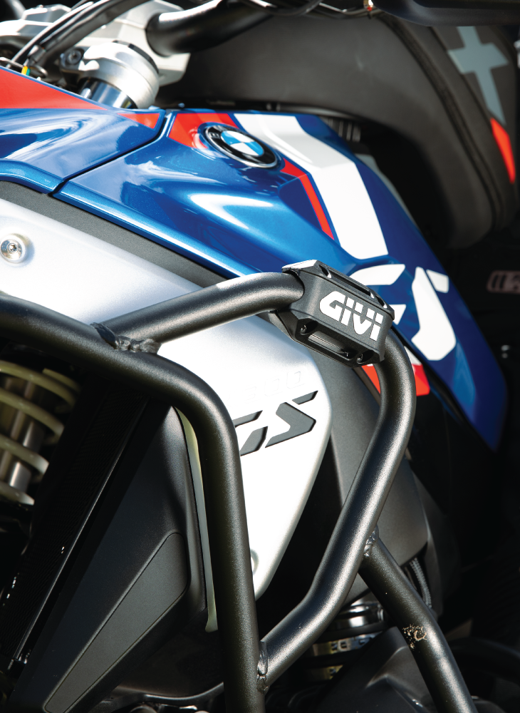 Heavy-duty motorcycle protection and racking system component for adventure bikes.