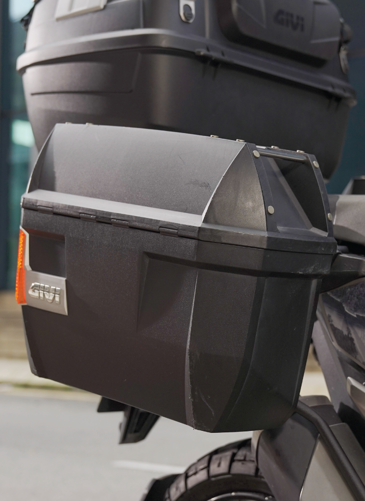 Hard-shell side cases displayed on motorcycle